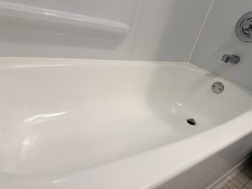 Bathtub refinished with Rustoleum tub kit, photographed six months after application